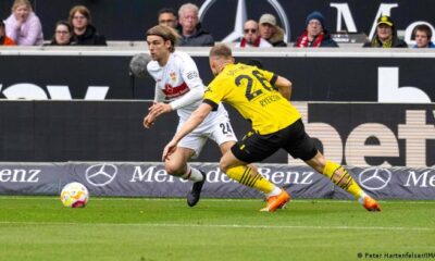Borna Sosa (left) and VfB Stuttgart secured a point against Borussia Dortmund when they were outnumbered