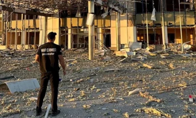 A member of Odesa Regional Prosecutor's Office personnel inspects damage following a Russian military attack, amid the country's invasion of Ukraine, in Odesa, Ukraine, in this image released September 25, 2023.
