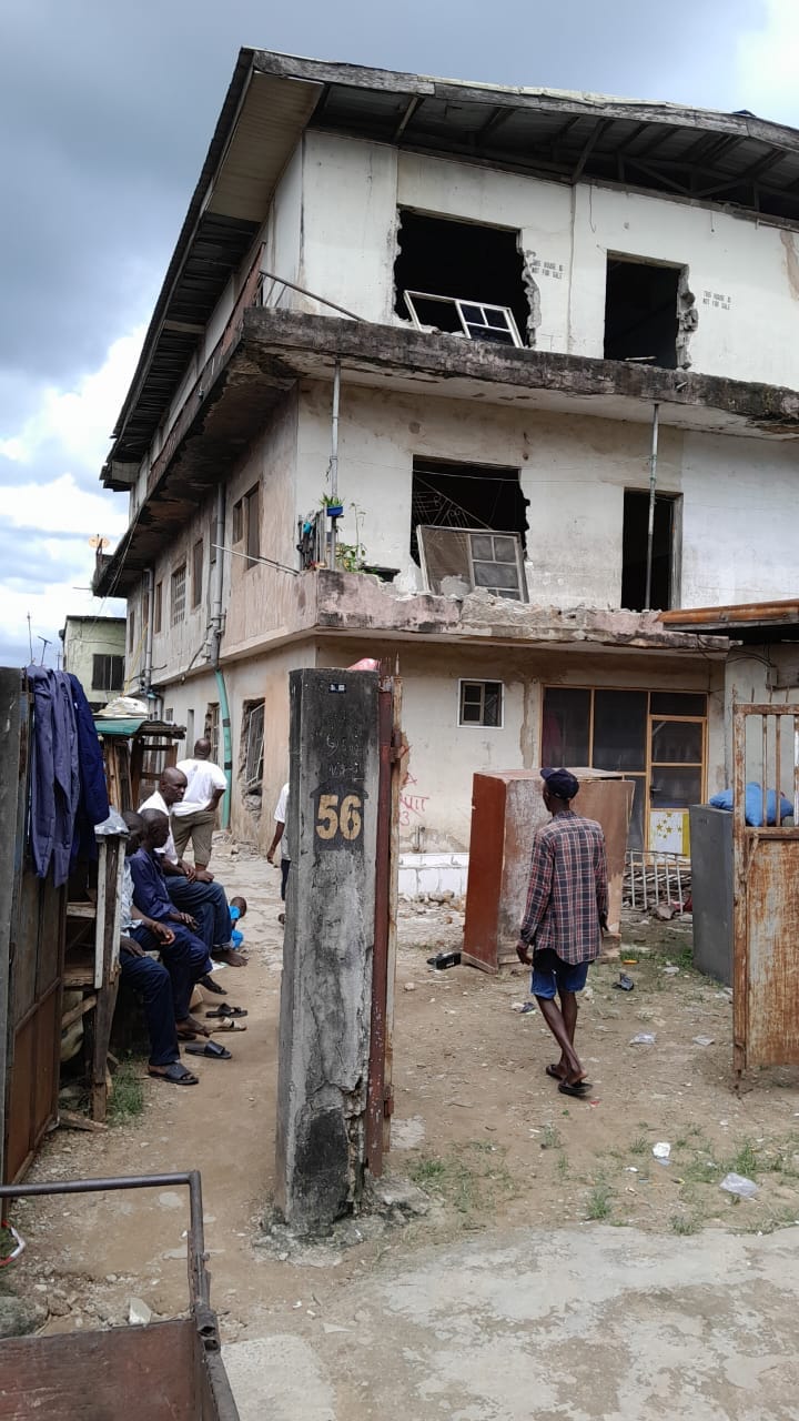 The residents were still trying to salvage their belongings when the building crumbled again on Sunday, destroying another structure inside the compound before collapsing completely.