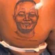 Lady gets gorgeous tattoo of boyfriend’s face on her back