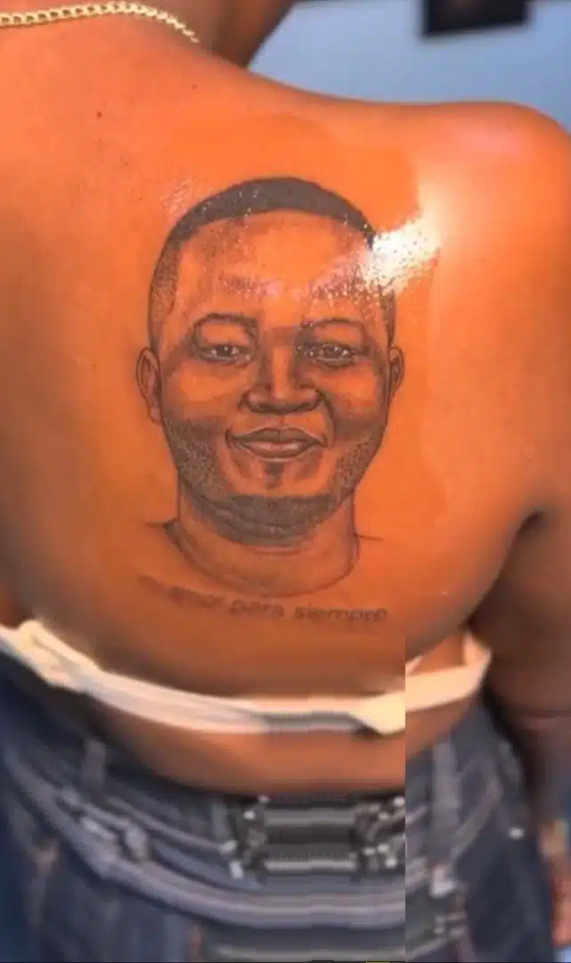 Lady gets gorgeous tattoo of boyfriend’s face on her back