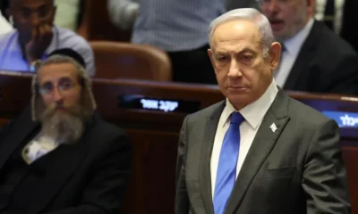 EPA Israeli Prime Minister stands in the Knesset in Jerusalem during a vote on 19 June 2024