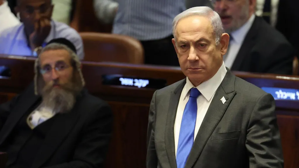 EPA Israeli Prime Minister stands in the Knesset in Jerusalem during a vote on 19 June 2024