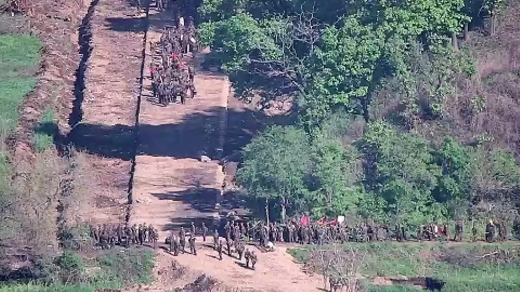 South Korean Joint Chiefs of Staff (JCS) Group of soldiers on an unpaved road, surrounded by vegetation