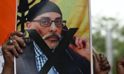Getty Images A protester holds a banner depicting Gurpatwant Singh Pannun, a US-Canadian lawyer designated as a Khalistani terrorist by Indian, during a rally in Delhi on September 24, 2023