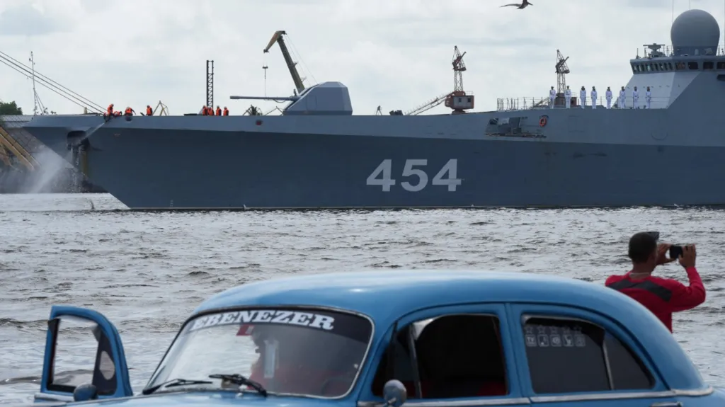 Reuters A man takes pictures of Russian frigate Admiral Gorshkov as it departs from Cuba on Monday