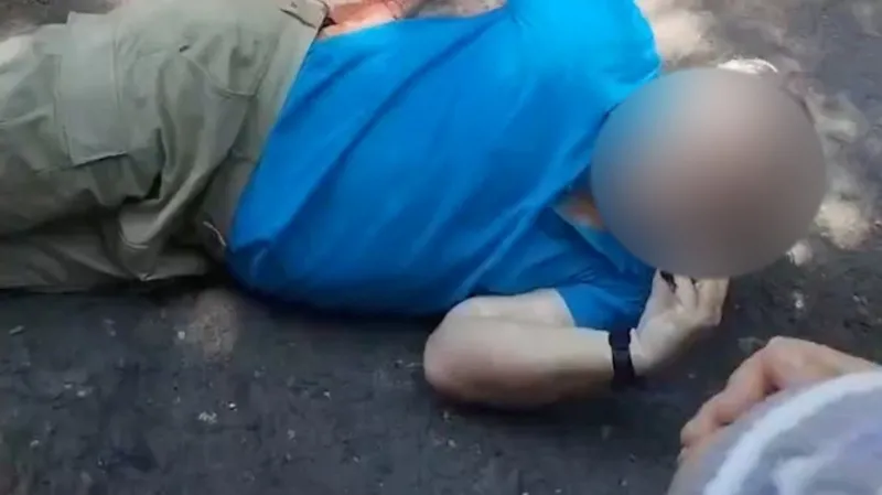 Reuters A man lies on the ground after a stabbing attack