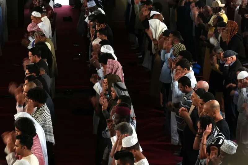 Getty Images Worshippers lined up for prayer