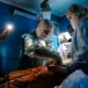 Doctors use phone lights to do surgery in Ukraine, November 2022